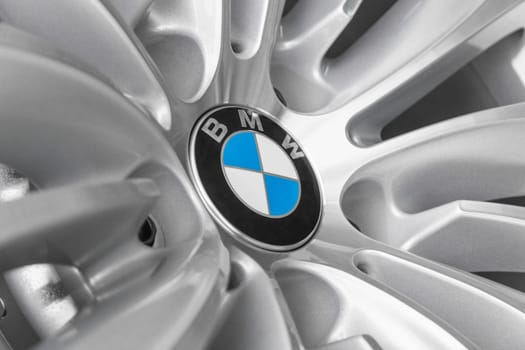 BMW European automobile manufacturer logotype on light alloy new design wheel for modern model of luxury business cars.