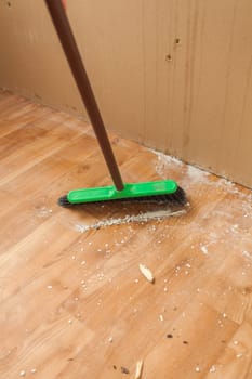 Photo of long swab cleaning dust and litter after renovation