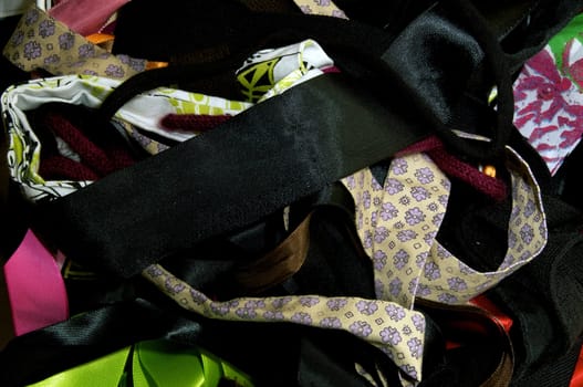 An assortment of various colors, patterns and fabrics makes up this image of craft supplies.