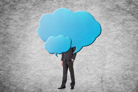 Young businessman with head behind the clouds.