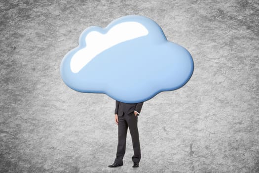 Young businessman with head behind the clouds.