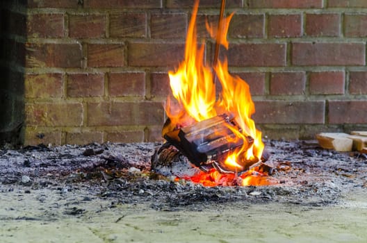 LWL-Open-Air Museum Hagen. Recordings courtesy of the Public Relations Department.. Fire,flames,campfire in front of a brick wall