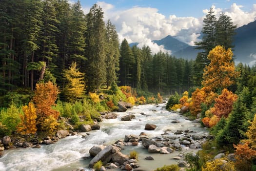 Mountain landscape with river,forest and mountains in autumn colours