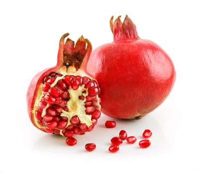 Ripe Sliced Pomegranate Fruit with Seeds Isolated on White Background