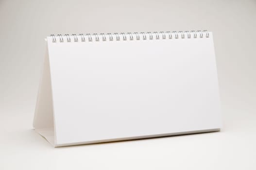 empty ring calendar on white background,format-filling