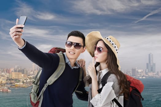 Asian couple travel and selfie in Kaohsiung, Taiwan, Asia.