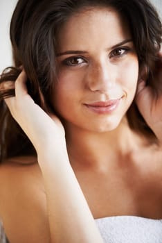 Hair care, beauty or portrait of woman after shower, cleaning or wellness routine results in studio. Hairstyle, white background or model with smile, natural skincare or healthy texture for grooming.