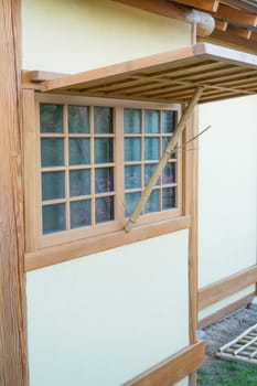 closeup of traditional wooden Japanese house outdoors