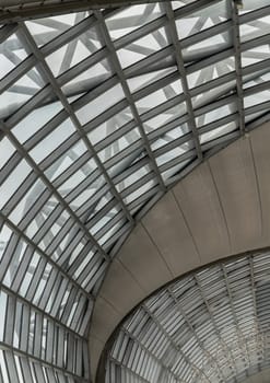 Bangkok, Thailand - Oct 05, 2023 - Modern architecture interior design of metal structure and glass at Suvarnabhumi Departure terminal. Departure area of Suvarnabhumi international airport (BKK). Space for text, Selective focus.