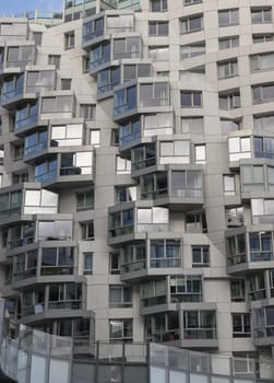London, UK - Oct 16, 2023 - Geometric design on a modern building complex with repeating structure. Exterior architecture of modern building, Space for text, Selective focus.