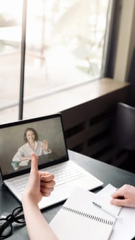 Virtual Meeting. Woman Engaged in Online Discussion or Web Conference. Online Work and Study. Woman Participating in a Web Chat Meeting