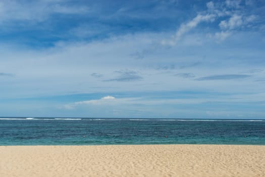 Beautiful secluded sandy beach in the Caribbean with white sand and blue sky as in paradise