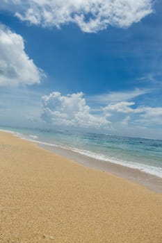 Beautiful secluded sandy beach in the Caribbean with white sand and blue sky as in paradise