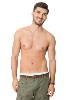 attractive muscular young man with free torso and beard isolated against white background