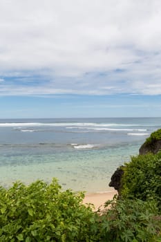 Beautiful secluded sandy beach in the Caribbean with white sand and blue sky as in paradise