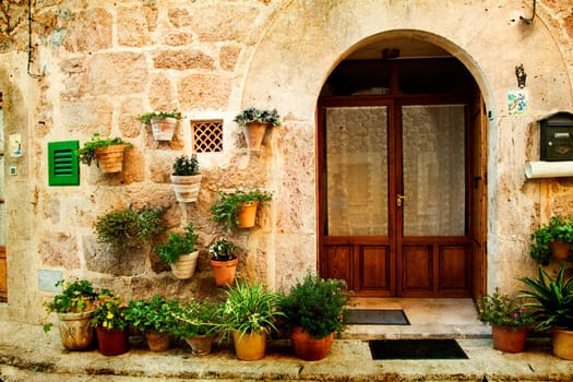 Vintage photo of traditional house in mediterranean village Valldemossa Mallorca, Spain