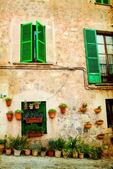 Vintage photo of traditional house in mediterranean village Valldemossa Mallorca, Spain