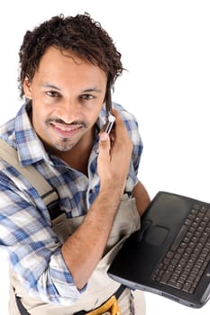 Carpenter with a phone and laptop