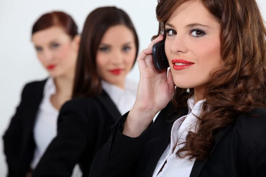 Three attractive business women