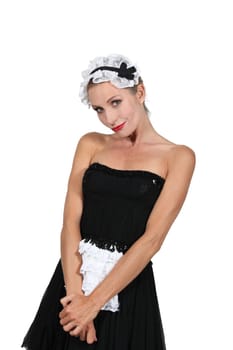 Model dressed in maid outfit