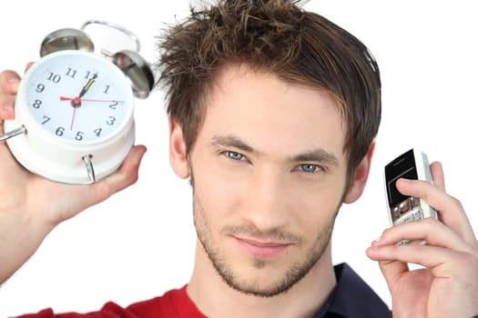 Man stood alarm clock and mobile