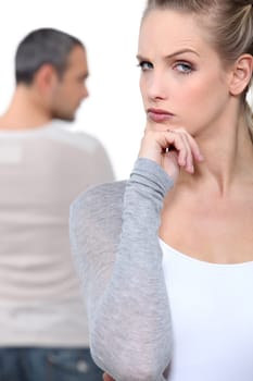 Blond woman grimacing