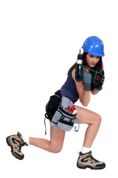Woman with a power drill