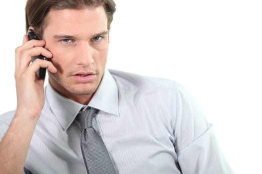 Young businessman on telephone