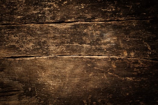 Background texture of old rustic weathered grunge cracked wood with a side vignette