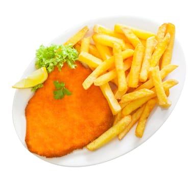 Golden crumbed veal schnitzel served with crisp potato chips or batons garnished with fresh frilly lettuce and lemon on a white platter, isolated on white