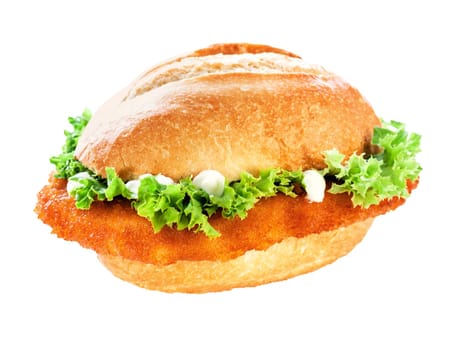 Tasty golden fried crumbed veal schnitzel or escalope bun topped with fresh green frilly lettuce and mayonnaise on white with clipping path