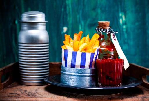 Tasty Homemade French Fries with Ketchup and Salt on Side. Good Source for Carbohydrates.