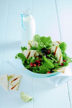 Gourmet Tasty Fresh Green Salad with Milk on White Wooden Table