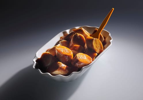 Sliced Ready to Eat Tasty Sausage on Gray Background