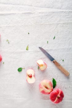Ready to Eat Sliced Fresh Apple on White Table Cloth