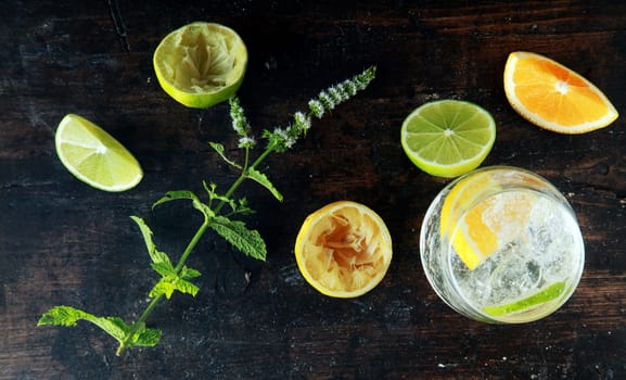 Preparing Lemon Water on Wooden Table for Meal. Source for Anti Oxidants