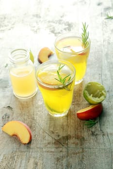Mouthwatering Yellow Fruit Juices on Wooden Table Ready to Drink. Healthy Drink for Detoxifying