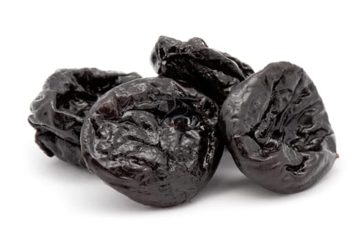 Prunes on a white background