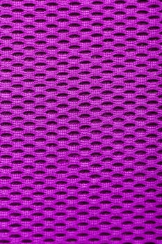 synthetic magenta cloth. grid closeup. macro. photo
