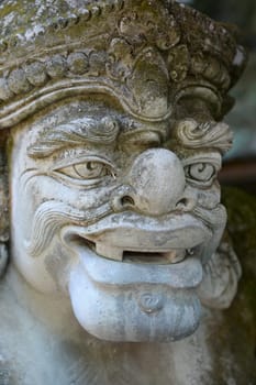 A close up shot of a Balinese statue