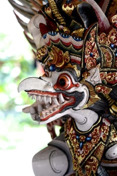 A close up shot of a Balinese statue