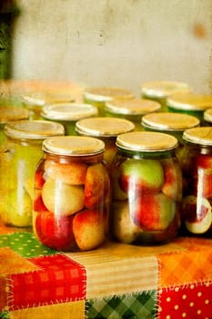 Jars of homemade fruit preserves - peach compote