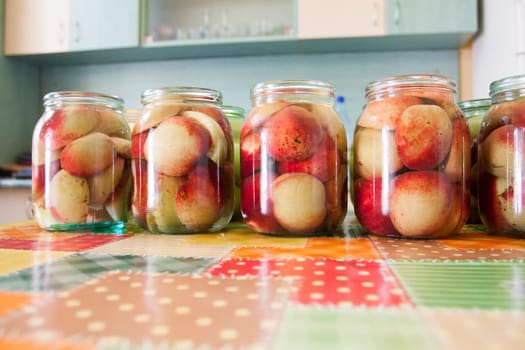 Jars of homemade fruit preserves - peach compote