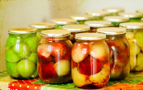 Jars of homemade fruit preserves - peach compote