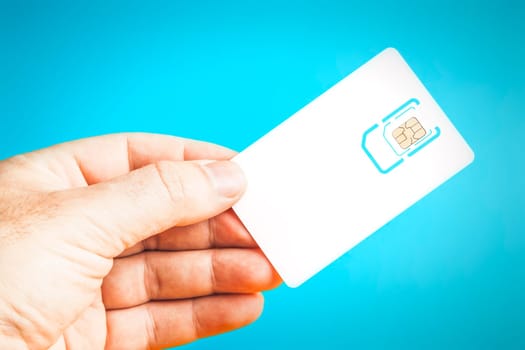 A man holding a blank smart card
