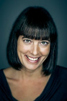 An image of a beautiful smiling woman