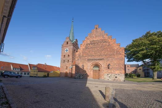 Large square in front of the church in Rudkabing