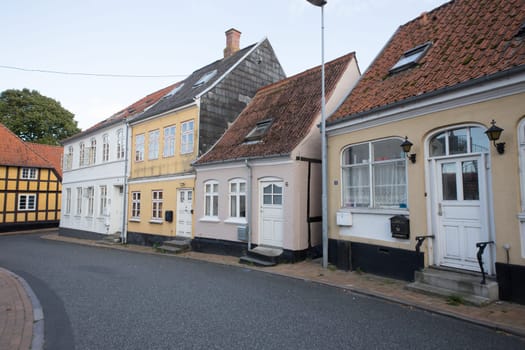 Four small houses in one street in Denmark's Rudkabing