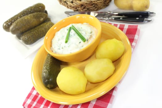 Herbal quark with peel potatoes and sour cucumber