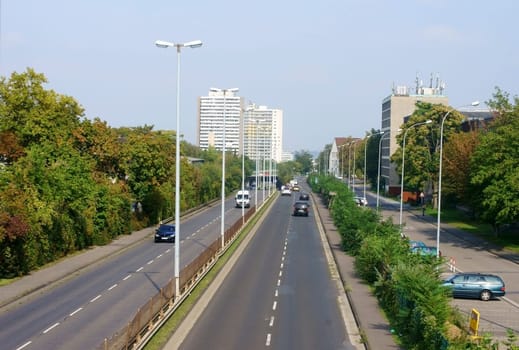 Mainz,Germany – September 05,2014: The Saarstraße,a highway with car traffic and adjacent high-rise buildings on September 5,2014 in Mainz.